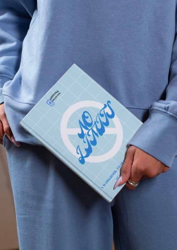 Black woman holding book in left hand